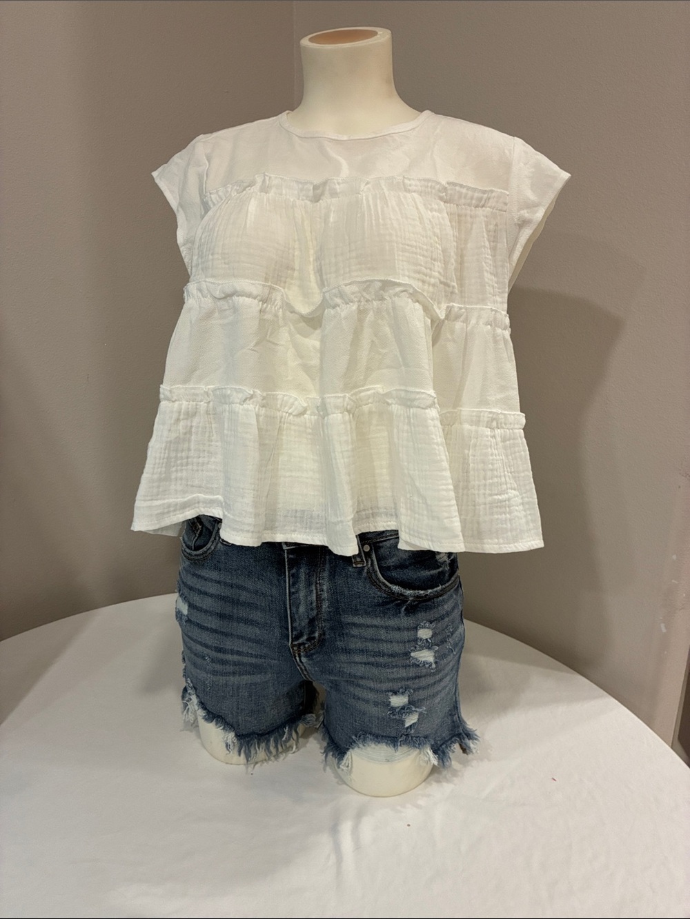 Tiered White Cotton Ruffle Sleeveless Top